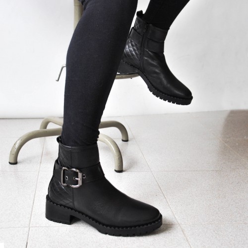 Padded leather ankle boots with buckle and zip